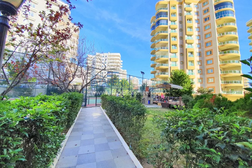 Квартира в Махмутларе с мебелью, застекленным балконом и видом на море  7 