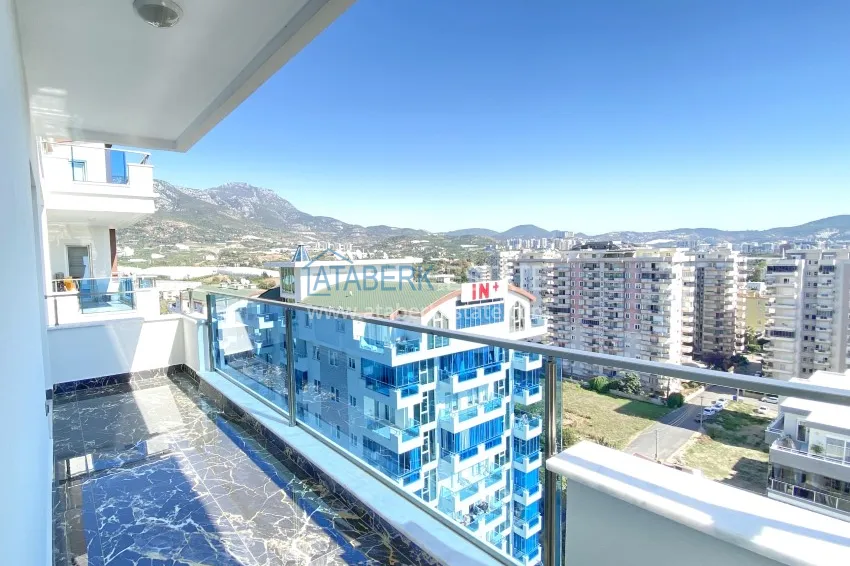 Приобрести Видовой двухуровневый пентхаус с авторским интерьером в районе Махмутлар 62 