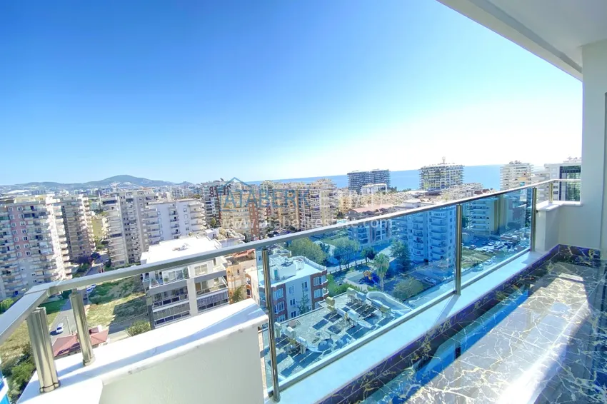 Приобрести Видовой двухуровневый пентхаус с авторским интерьером в районе Махмутлар 63 