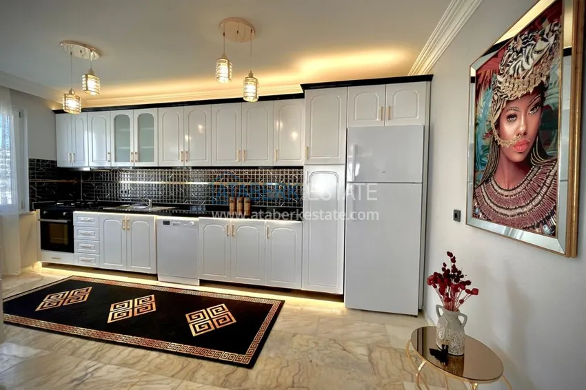 Приобрести Квартира в Махмутларе трехкомнатная с современной мебелью, видом на море и горы 9 