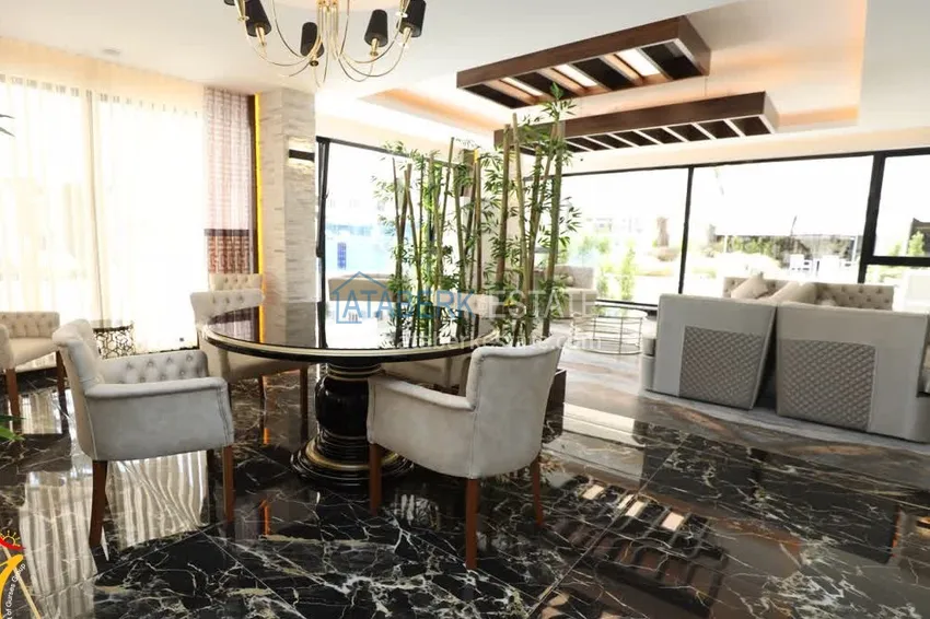 Видовой двухуровневый пентхаус с авторским интерьером в районе Махмутлар 9 