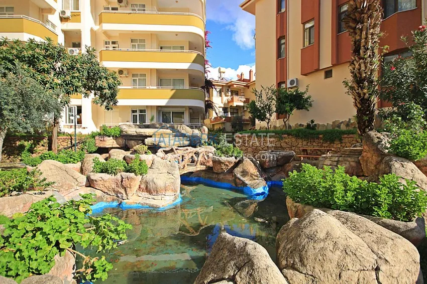 Двухуровневая квартира в Махмутларе с мебелью и отдельной кухней 7 