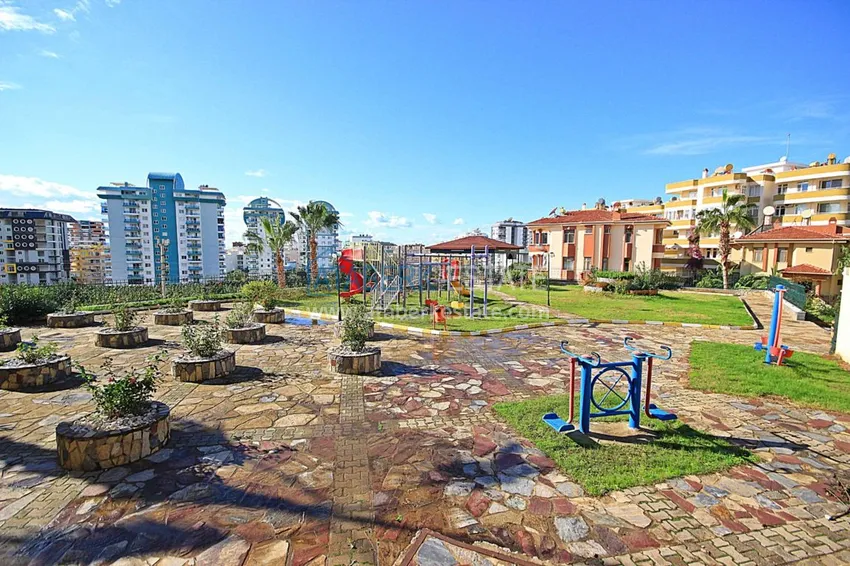 Двухуровневая квартира в Махмутларе с мебелью и отдельной кухней 9 