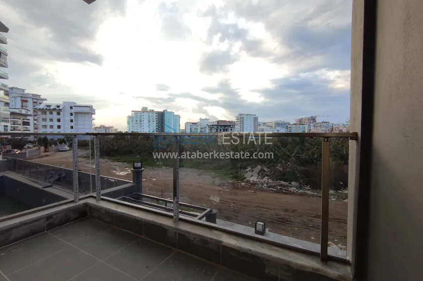 Приобрести Квартира - Новостройка в Махмутларе двухкомнатная с чистовой отделкой  9 