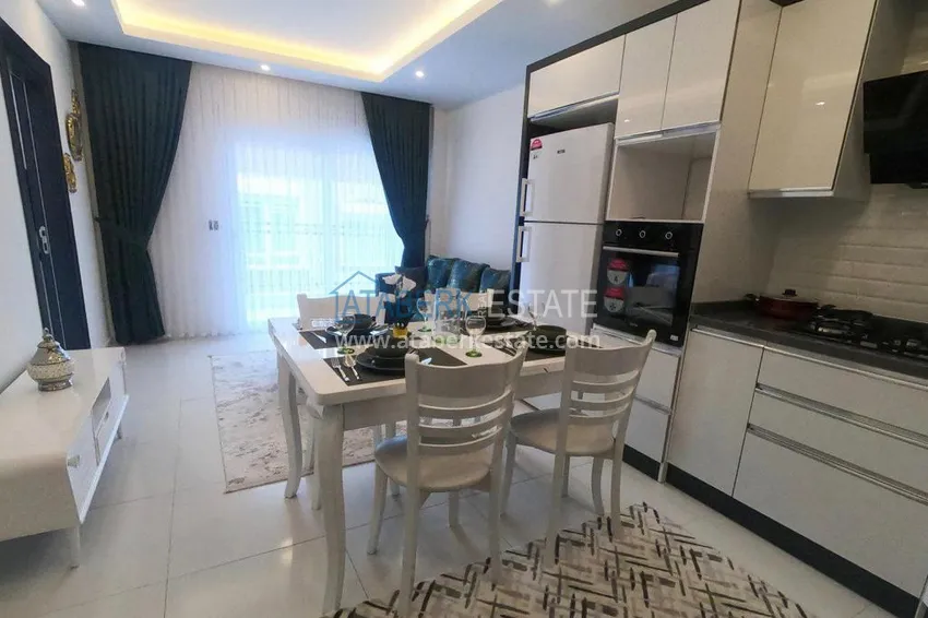 Приобрести Квартира в Махмутларе с мебелью, в новом комплексе 8 