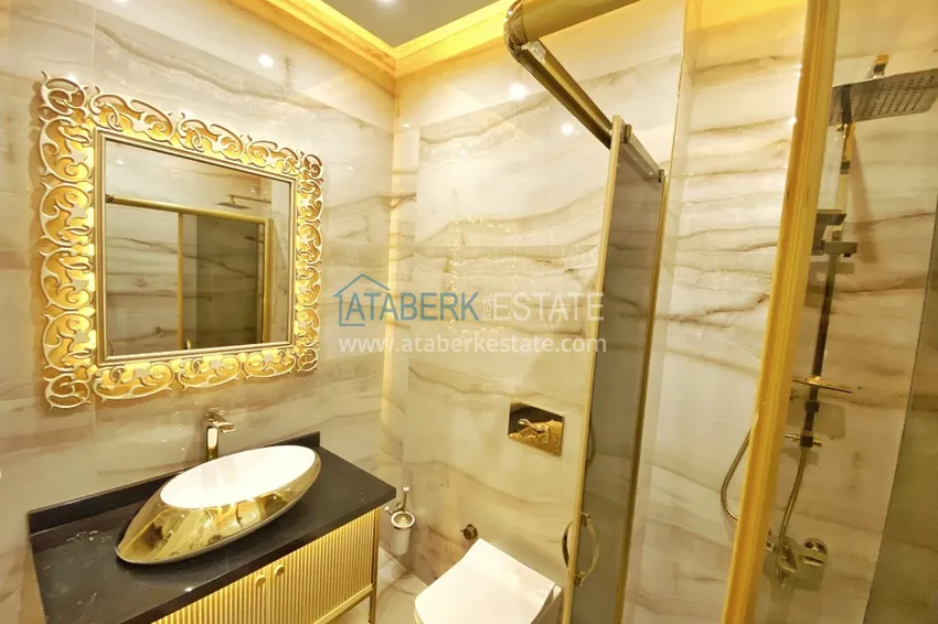 Приобрести Видовой двухуровневый пентхаус с авторским интерьером в районе Махмутлар 70 