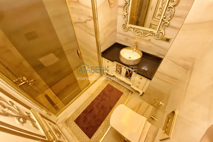 Приобрести Видовой двухуровневый пентхаус с авторским интерьером в районе Махмутлар 71 