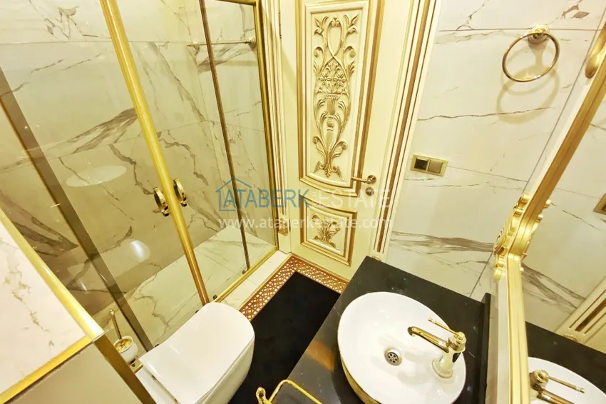 Приобрести Видовой двухуровневый пентхаус с авторским интерьером в районе Махмутлар 73 