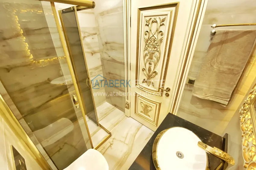 Приобрести Видовой двухуровневый пентхаус с авторским интерьером в районе Махмутлар 76 