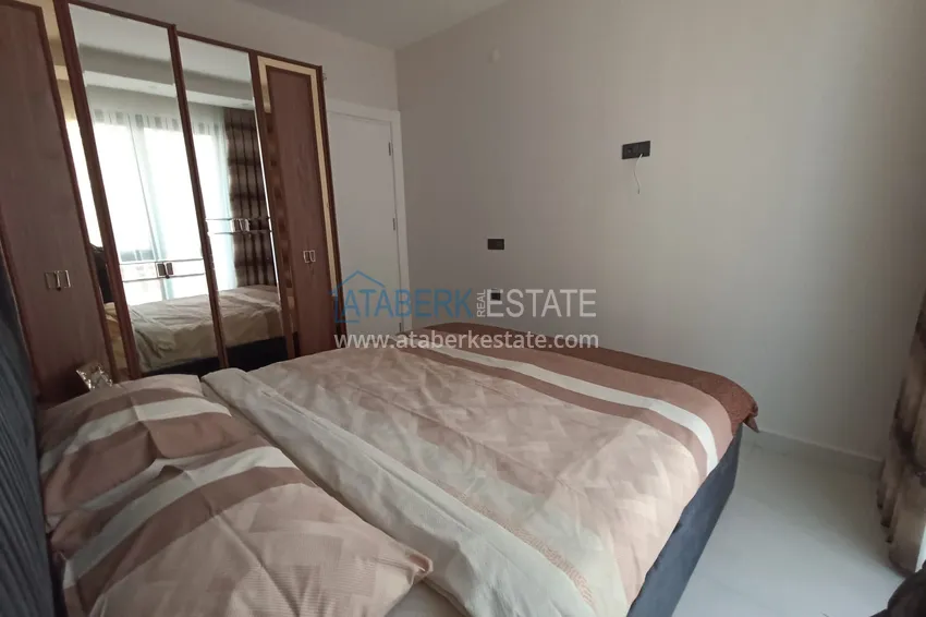 Приобрести Квартира в Махмутларе с новой мебелью, в центре района рядом с морем 10 