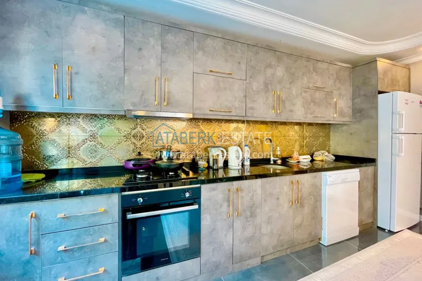 Приобрести Квартира в Махмутларе трехкомнатная меблированная с авторским ремонтом 10 