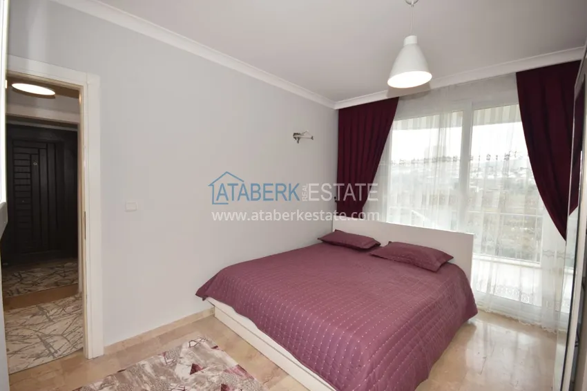 Приобрести Квартира в Махмутларе с мебелью и видом на море и горы в жилом комплексе 11 