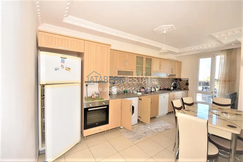 Приобрести Квартира в Махмутларе трехкомнатная - с мебелью, в жилом комплексе 12 