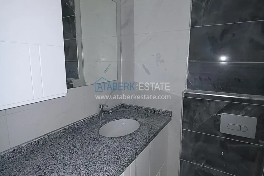 Приобрести Квартира в Махмутларе с новой мебелью, в центре района рядом с морем 11 