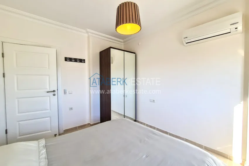 Приобрести Двухуровневый пентхаус в Махмутларе с видом на море  11 