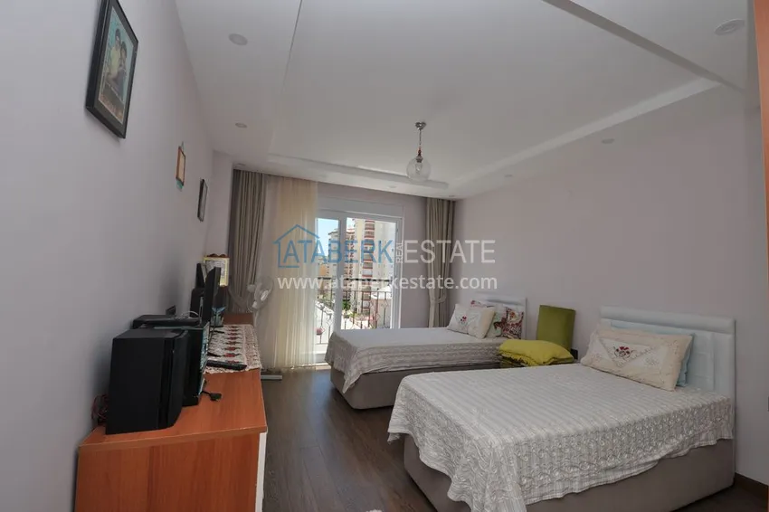 Приобрести Срочная продажа! Пентхаус в Махмутларе с мебелью в жилом доме – центральное расположение 12 