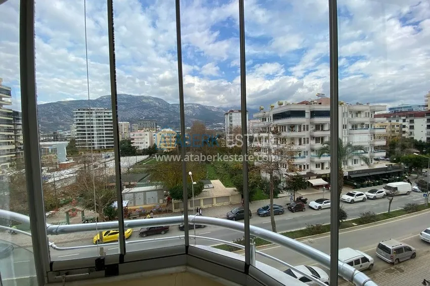 Приобрести Квартира в Махмутларе меблированная с видом на горы и море в комплексе на первой линии 12 