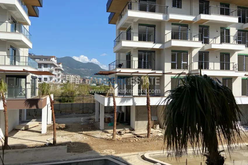 Приобрести Квартира в районе Оба от инвестора с чистовой отделкой и видом на горы 13 