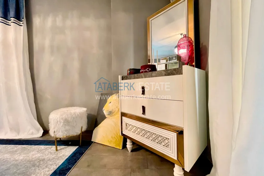 Приобрести Квартира в Махмутларе трехкомнатная меблированная с авторским ремонтом 14 