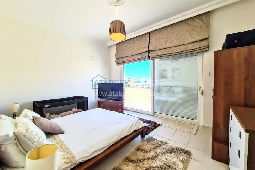 Приобрести Двухуровневый пентхаус в Махмутларе с видом на море  14 