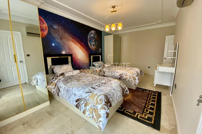 Приобрести Квартира в центре района Махмутлар после ремонта с новой современной мебелью 16 