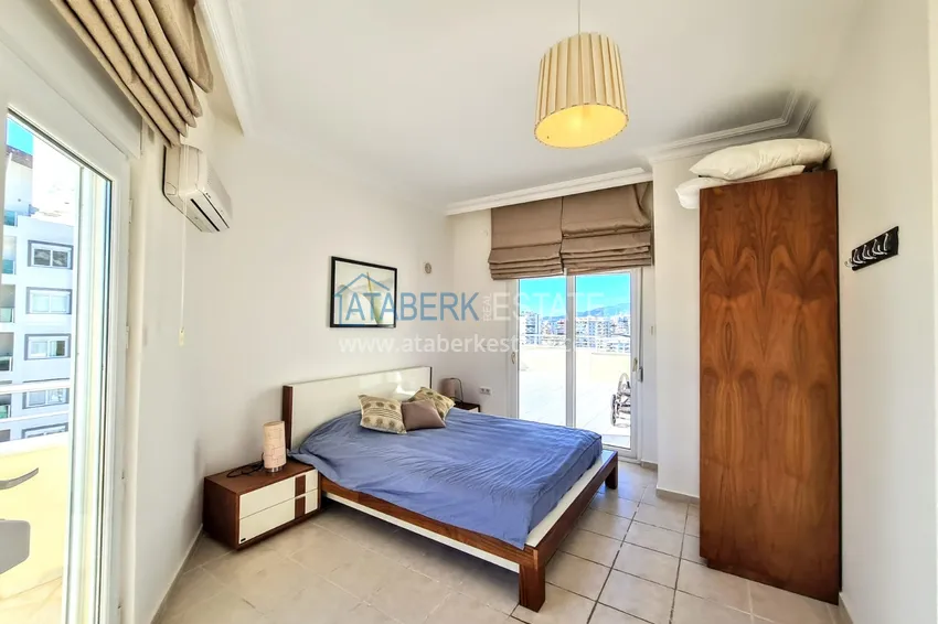 Приобрести Двухуровневый пентхаус в Махмутларе с видом на море  15 