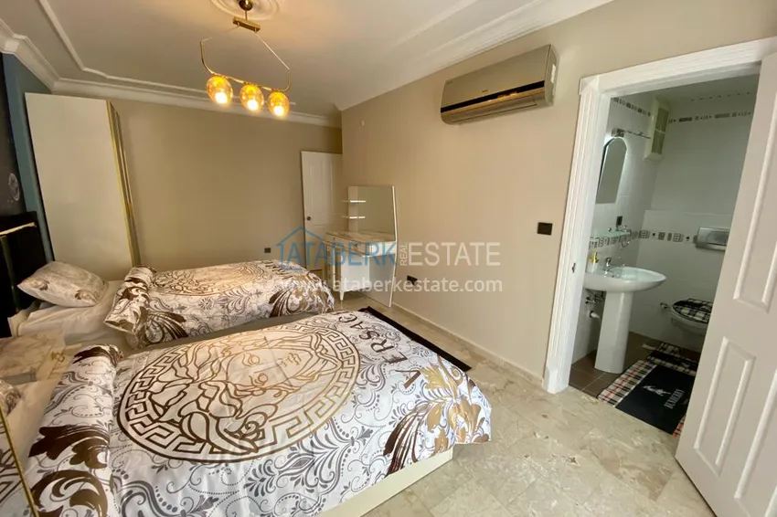 Приобрести Квартира в центре района Махмутлар после ремонта с новой современной мебелью 17 