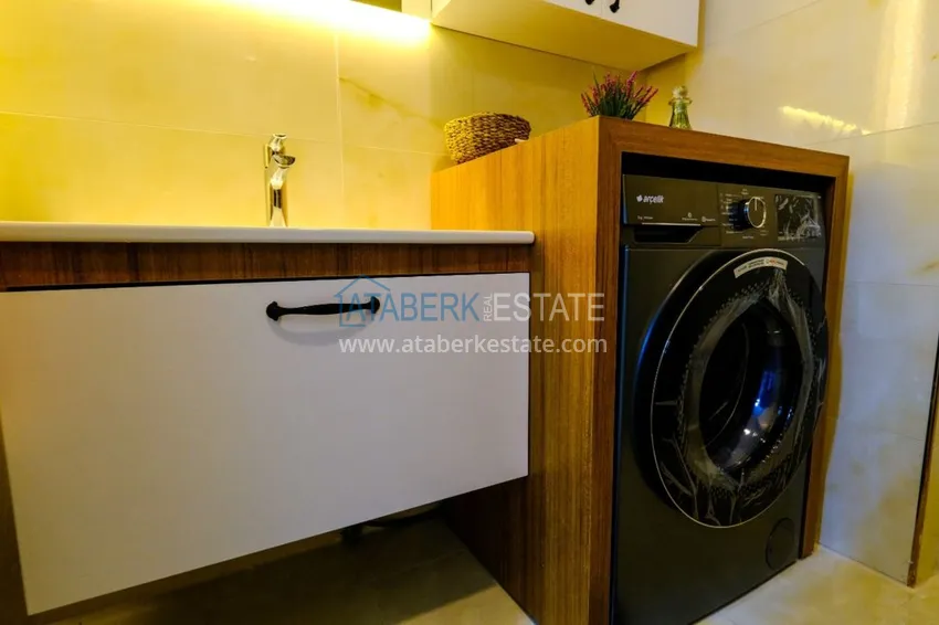 Приобрести Квартира в Махмутларе с мебелью и видом на море на первой береговой линии 15 