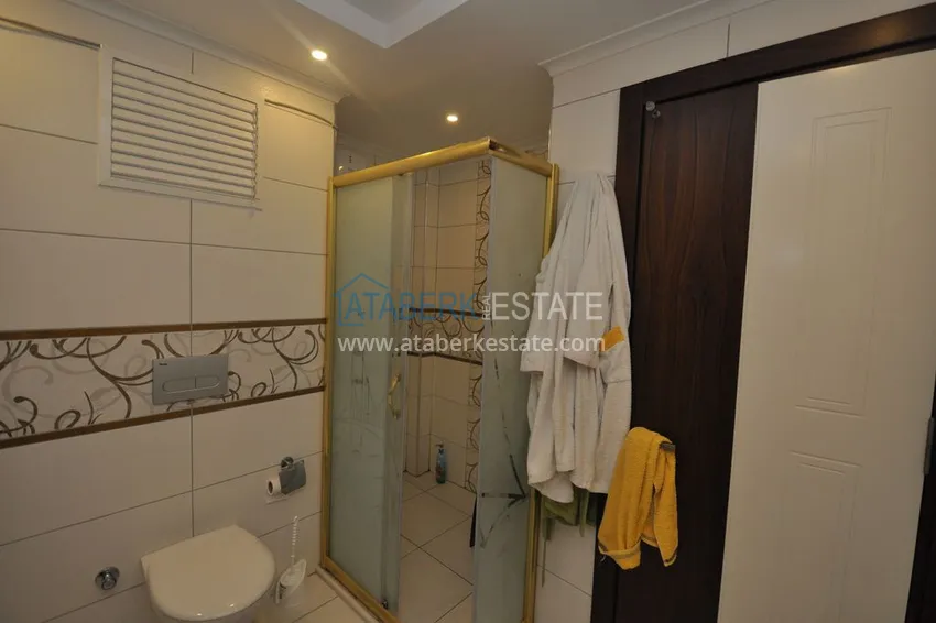 Приобрести Срочная продажа! Пентхаус в Махмутларе с мебелью в жилом доме – центральное расположение 16 