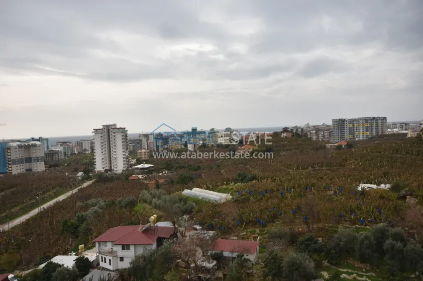 Приобрести Квартира в Махмутларе с мебелью и видом на море и горы в жилом комплексе 17 