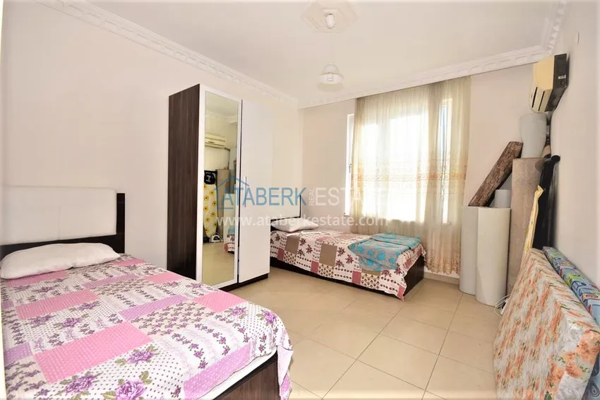 Приобрести Квартира в Махмутларе трехкомнатная - с мебелью, в жилом комплексе 19 