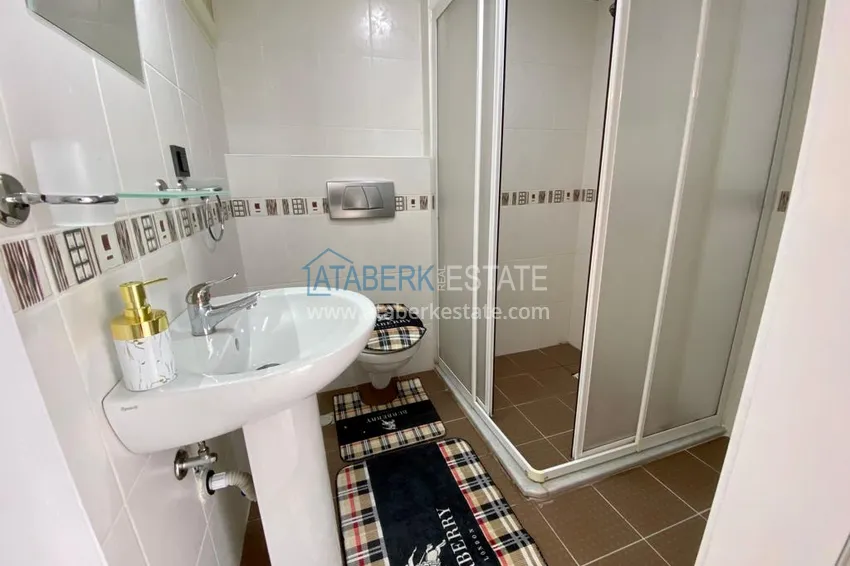 Приобрести Квартира в центре района Махмутлар после ремонта с новой современной мебелью 18 