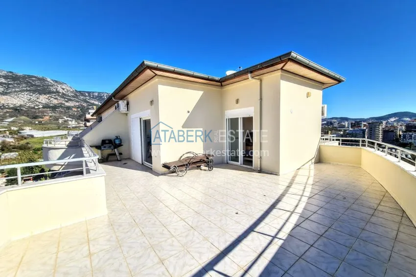 Приобрести Двухуровневый пентхаус в Махмутларе с видом на море  17 