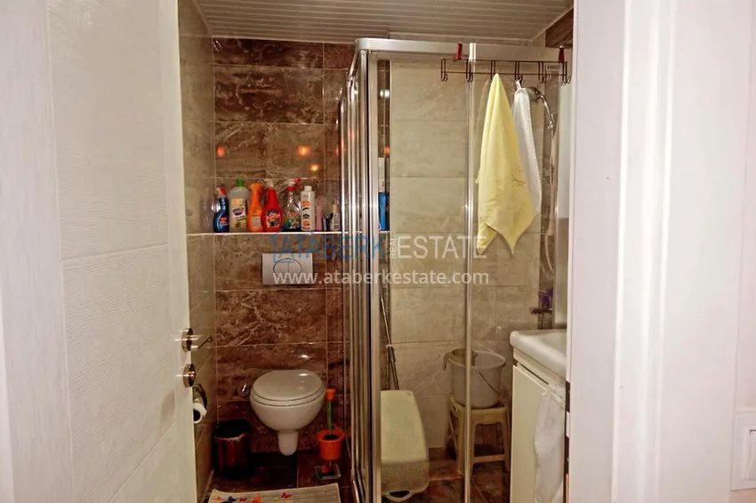 Приобрести Квартира в Махмутларе меблированная с видом на горы в 100 метрах от моря 12 