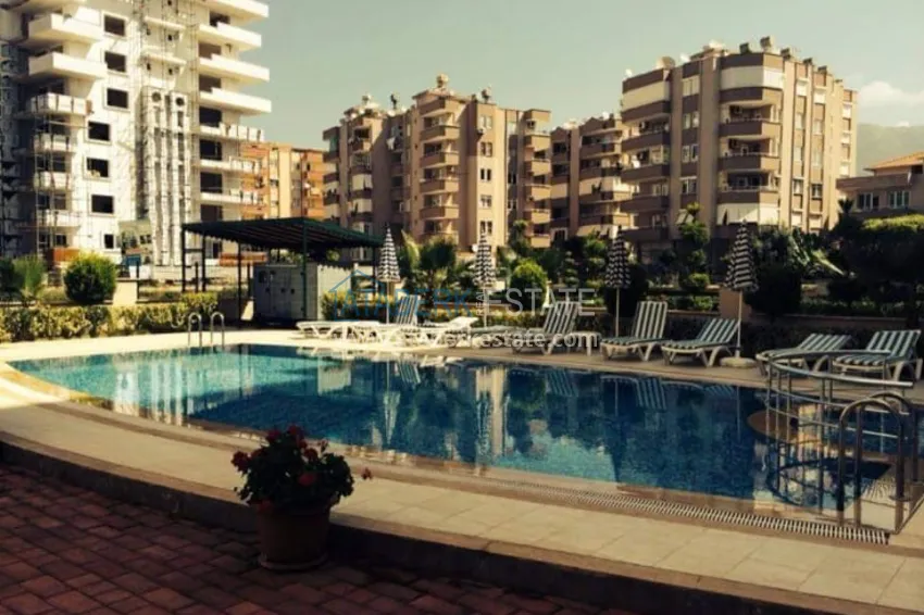 Квартира в Махмутларе трехкомнатная, рядом с морем – 150 метров 1 