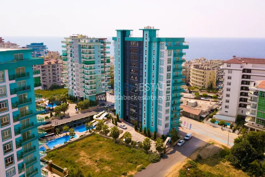 Квартира в Махмутларе в жилом комплексе, с развитой инфраструктурой 1 