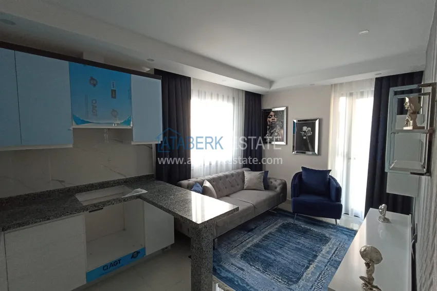 Квартира в Махмутларе с новой мебелью, в центре района рядом с морем 1 