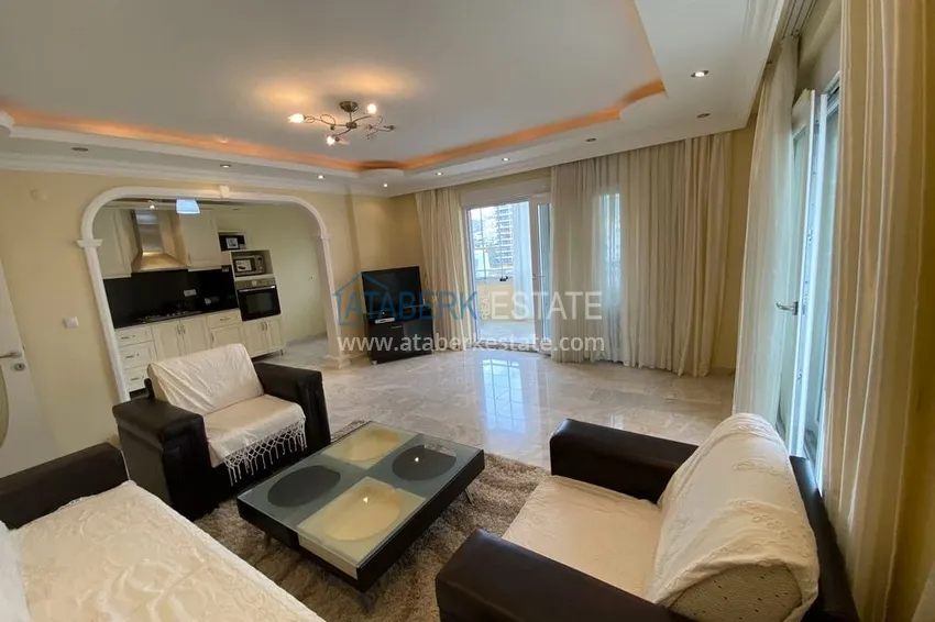 Приобрести Квартира в Махмутларе меблированная с видом на горы и море в комплексе на первой линии 3 