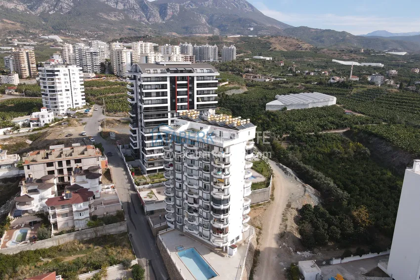 Квартира в Махмутларе, меблированная с видом на горы и море 4 