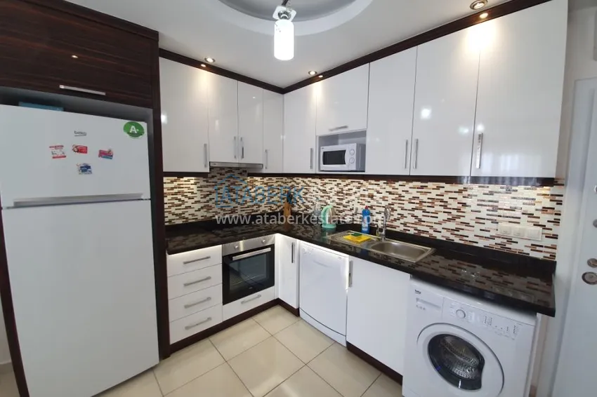 Приобрести Квартира в Махмутларе, с мебелью в комплексе класса-люкс 4 