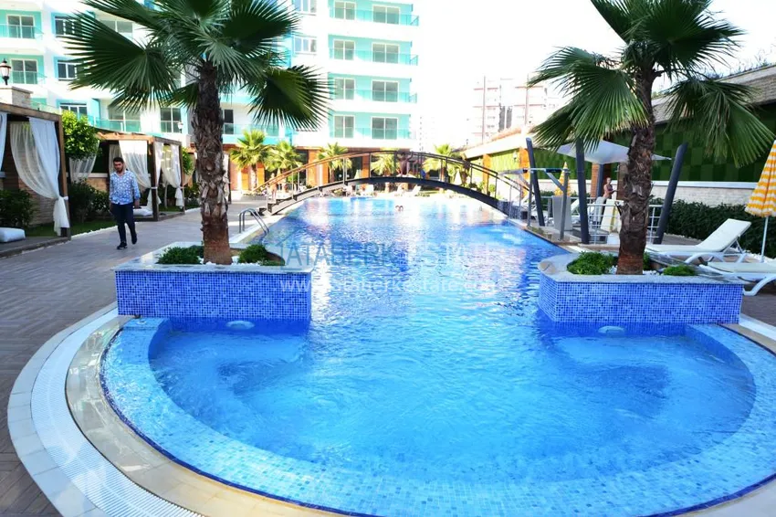 Квартира в Махмутларе в жилом комплексе, с развитой инфраструктурой 4 