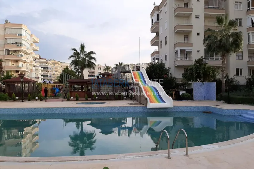 Квартира в Махмутларе меблированная с видом на горы и море в комплексе на первой линии 6 