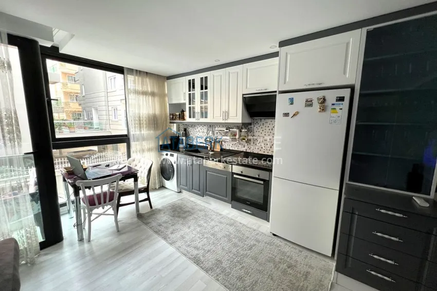 Приобрести Квартира в центре Алании, двухкомнатная с мебелью - район пляжа Клеопатра 7 