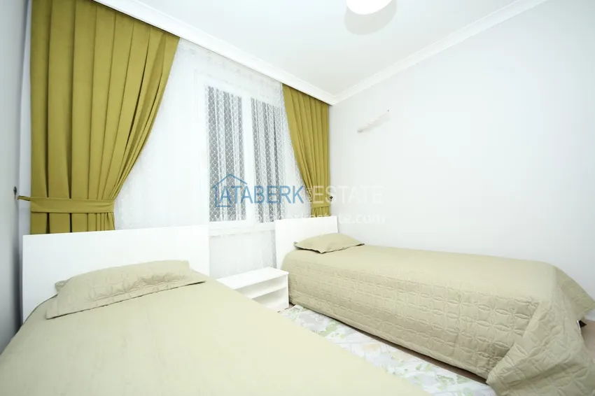 Приобрести Квартира в Махмутларе с мебелью и видом на море и горы в жилом комплексе 9 