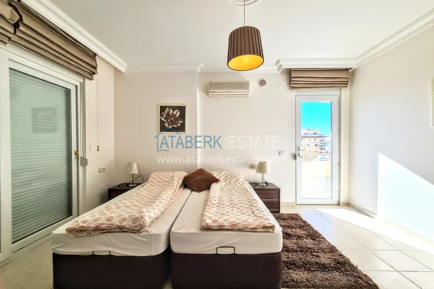 Приобрести Двухуровневый пентхаус в Махмутларе с видом на море  9 