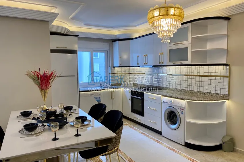 Приобрести Квартира в центре района Махмутлар после ремонта с новой современной мебелью 11 