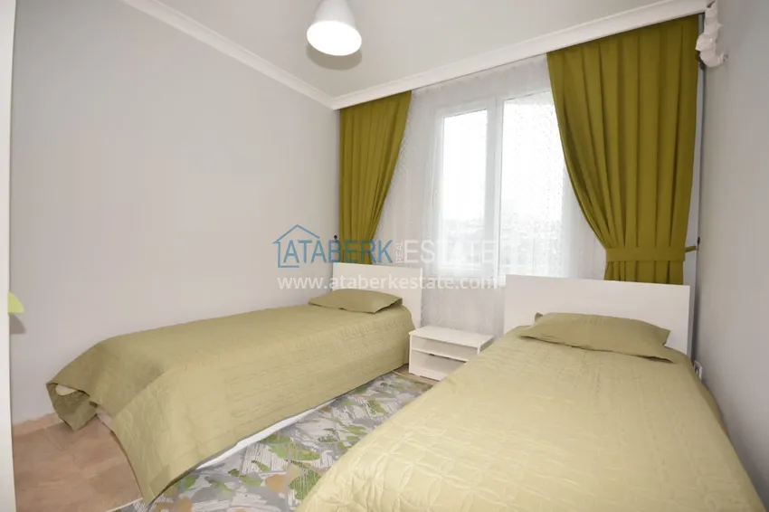 Приобрести Квартира в Махмутларе с мебелью и видом на море и горы в жилом комплексе 10 