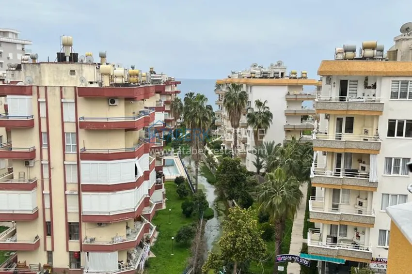 Приобрести Квартира в районе Махмутлар с мебелью и видом на море в жилом комплексе с бассейном  11 