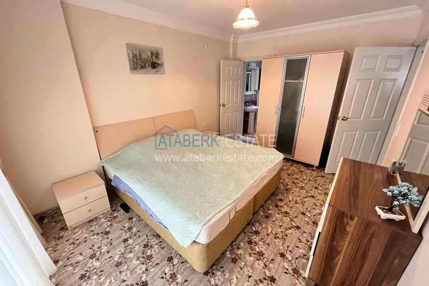 Приобрести Квартира в районе Махмутлар с мебелью и видом на море в жилом комплексе с бассейном  12 