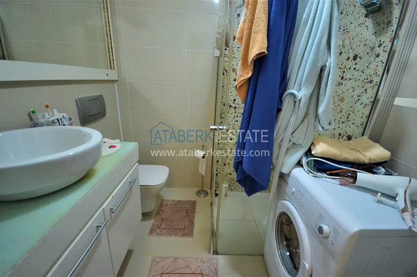 Приобрести Квартира в Конаклы меблированная с личным садом 11 